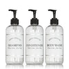Three soap dispensers for showers with waterproof labels. Shampoo bottles for hotels and homes.