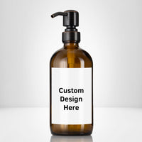 Elegant amber glass 16 oz boston round bottle personalized customized with waterproof label, printed on demand with choice of pumps including stainless steel for kitchen, amenities, hospitality, businesses, bathrooms.