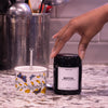 A 250 ml ultraviolet glass jar (AKA Infinity Jars, AKA Miron Jars)sold customized by Artanis Home.