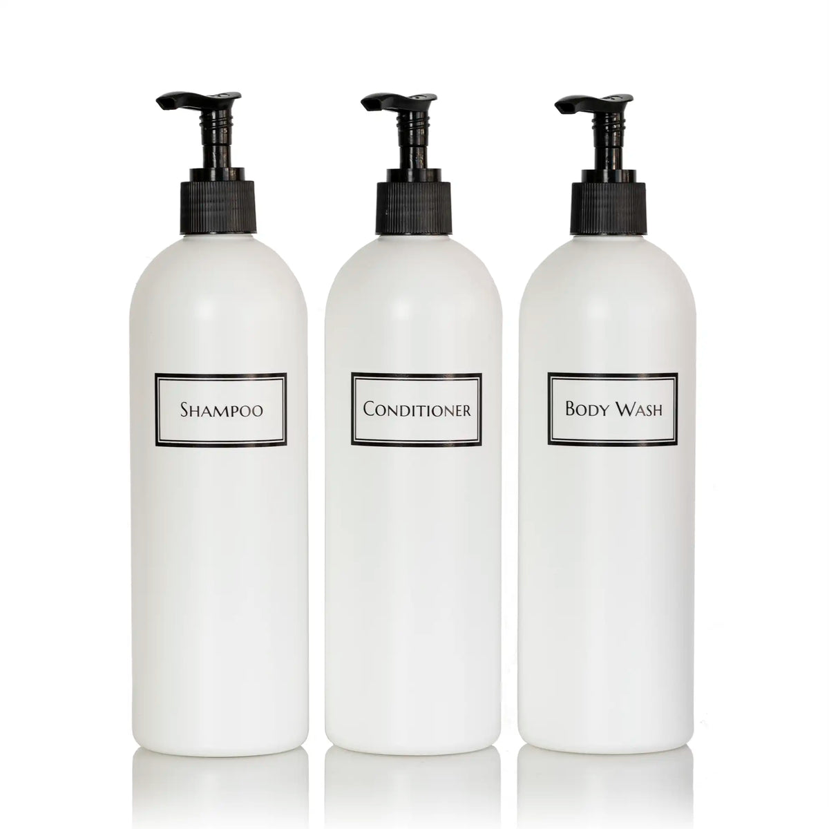 Tall white plastic set of shower bottles with black pumps and silkscreen print for shampoo, conditioner, and body wash