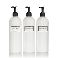 Tall white plastic set of shower bottles with black pumps and silkscreen print for shampoo, conditioner, and body wash