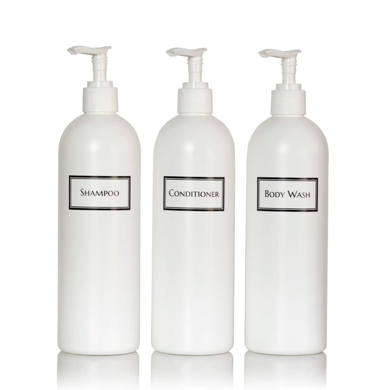 Tall white plastic set of shower bottles with white pumps and silkscreen print for shampoo, conditioner, and body wash