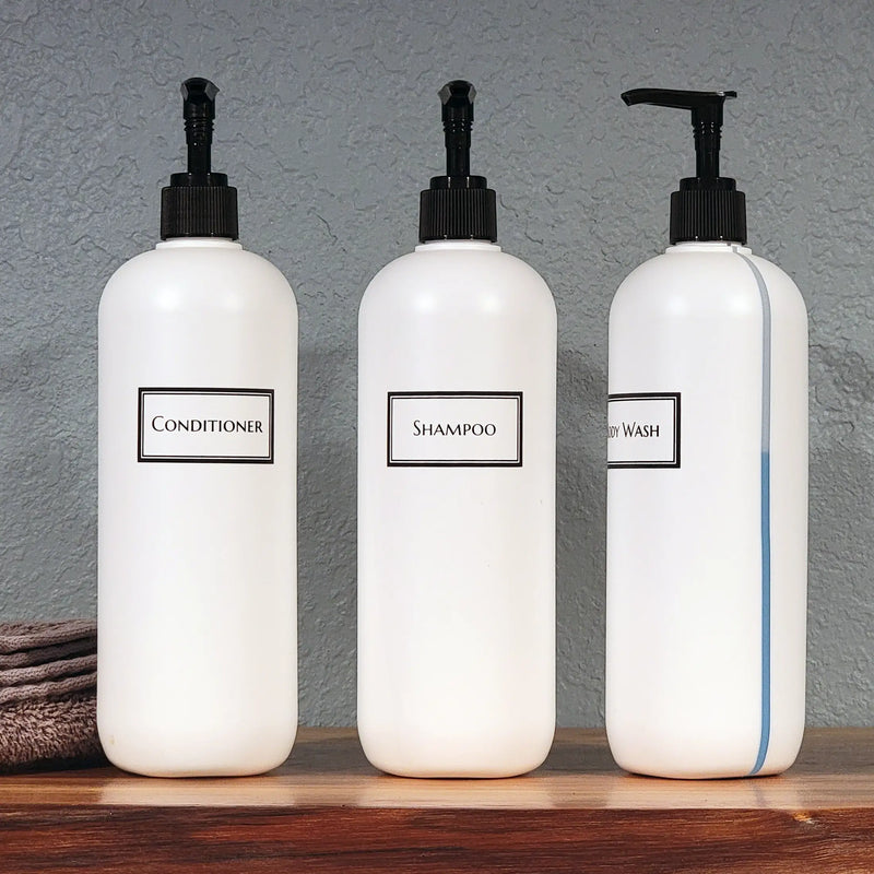 Set of 3 white HDPE plastic refillable printed shower bottles with a view stripe on the side to view fill level.