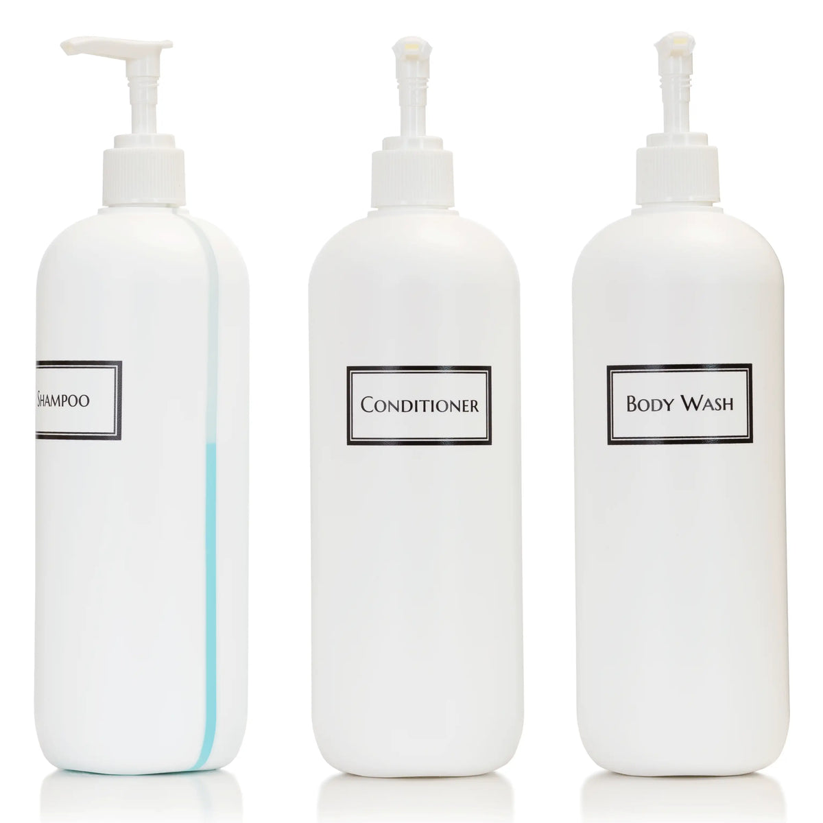 Three tall white 19 oz bottles with print that reads "Shampoo", "Conditioner", and "Body Wash" with one turned to see the view stripe on the side revealing  the blue shampoo fill level.
