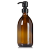 Amber 16 oz glass apothecary bottle with 304 grade stainless steel pump with black satin finish.