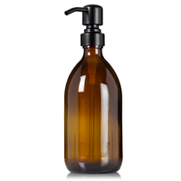 Amber 16 oz glass apothecary bottle with 304 grade stainless steel pump with black satin finish.