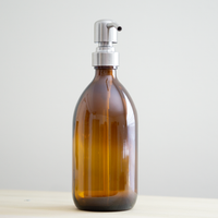 Amber glass 16 oz apothecary bottle with 304 grade stainless steel pump.